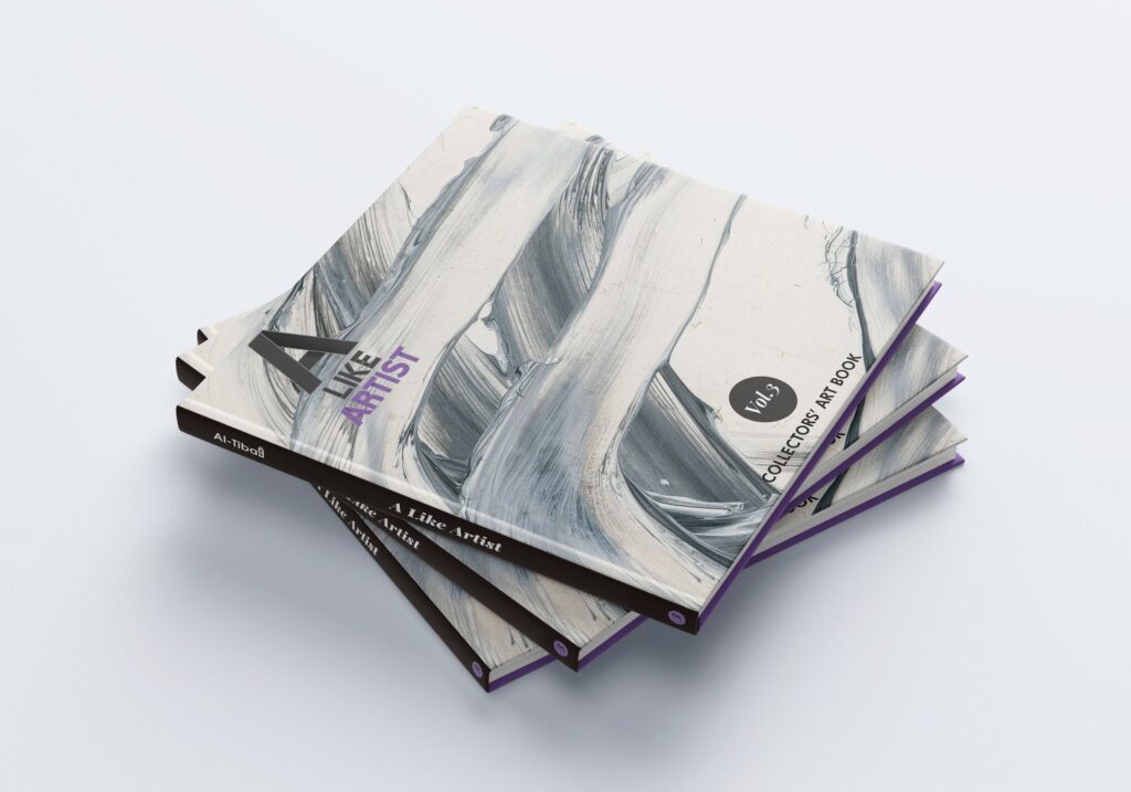 Hardcover copies of A LIKE ARTIST Vol. 03 collectors’ art book by AL-TIBA9