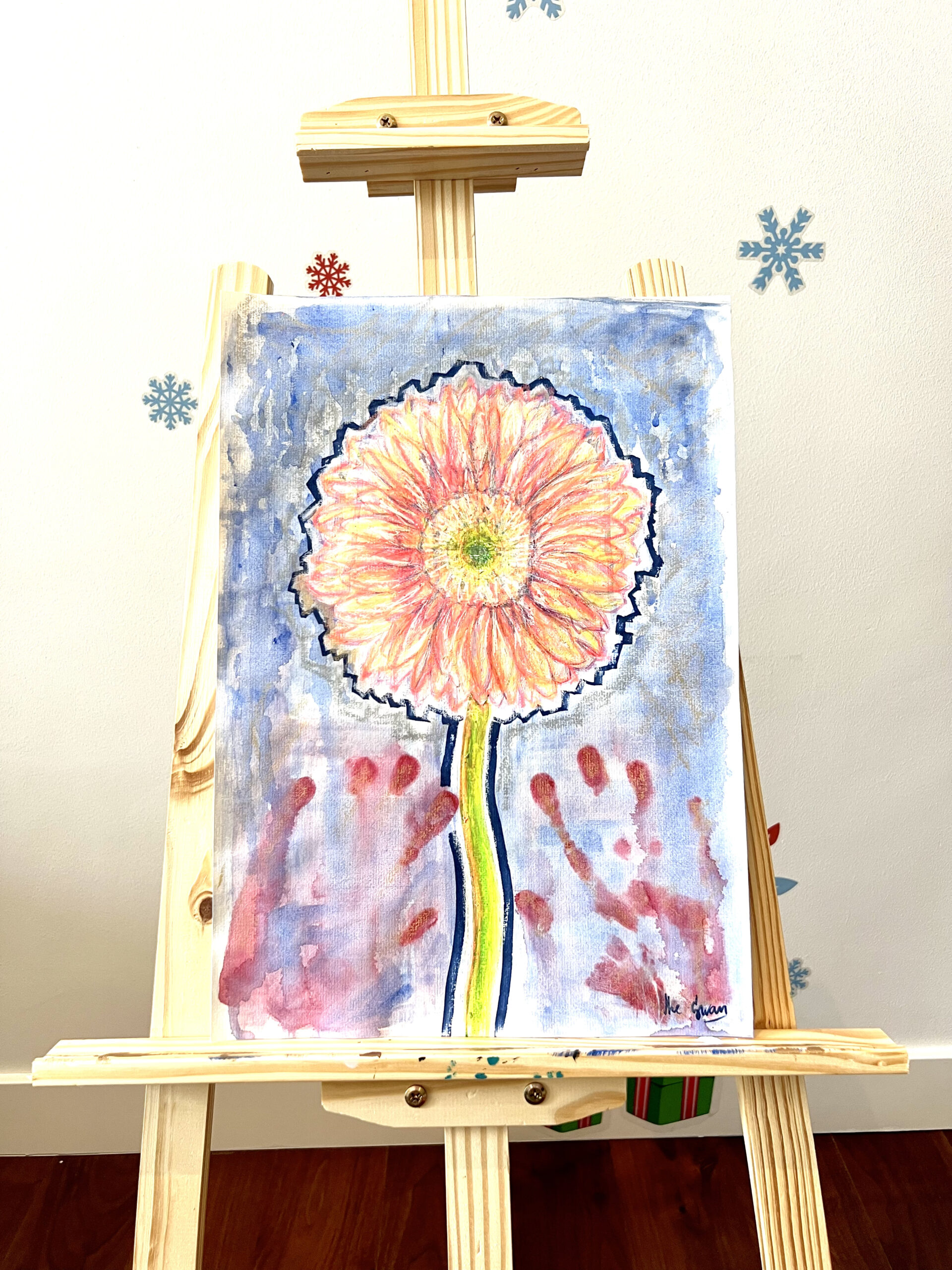 Gerbera Daisy by Lana Swan shown on a wooden easel