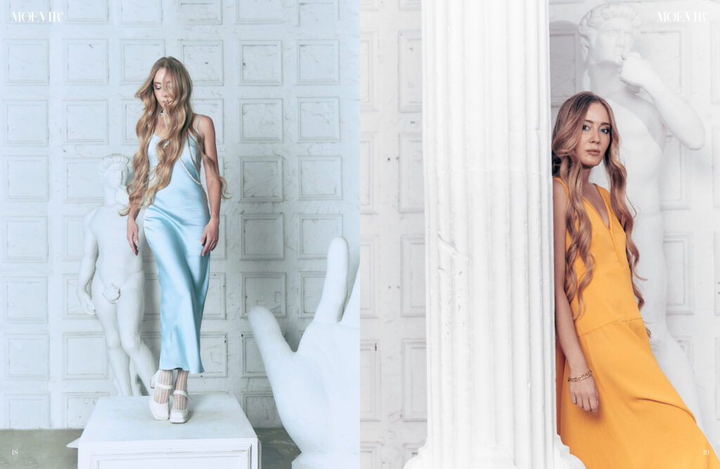 MOEVIR Magazine spread with Lana Swan in a blue dress and in an orange dress beside white columns
