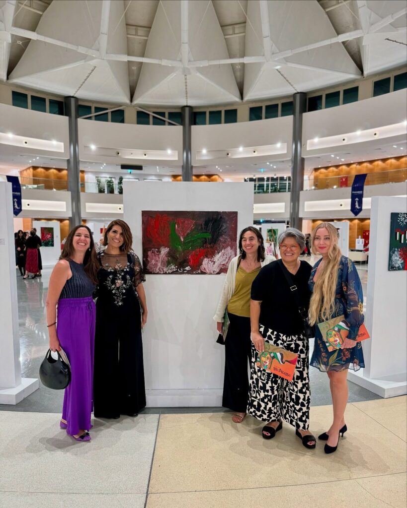 Lana Swan with guests in the exhibition hall, Sorbonne University Abu Dhabi, December 2024
