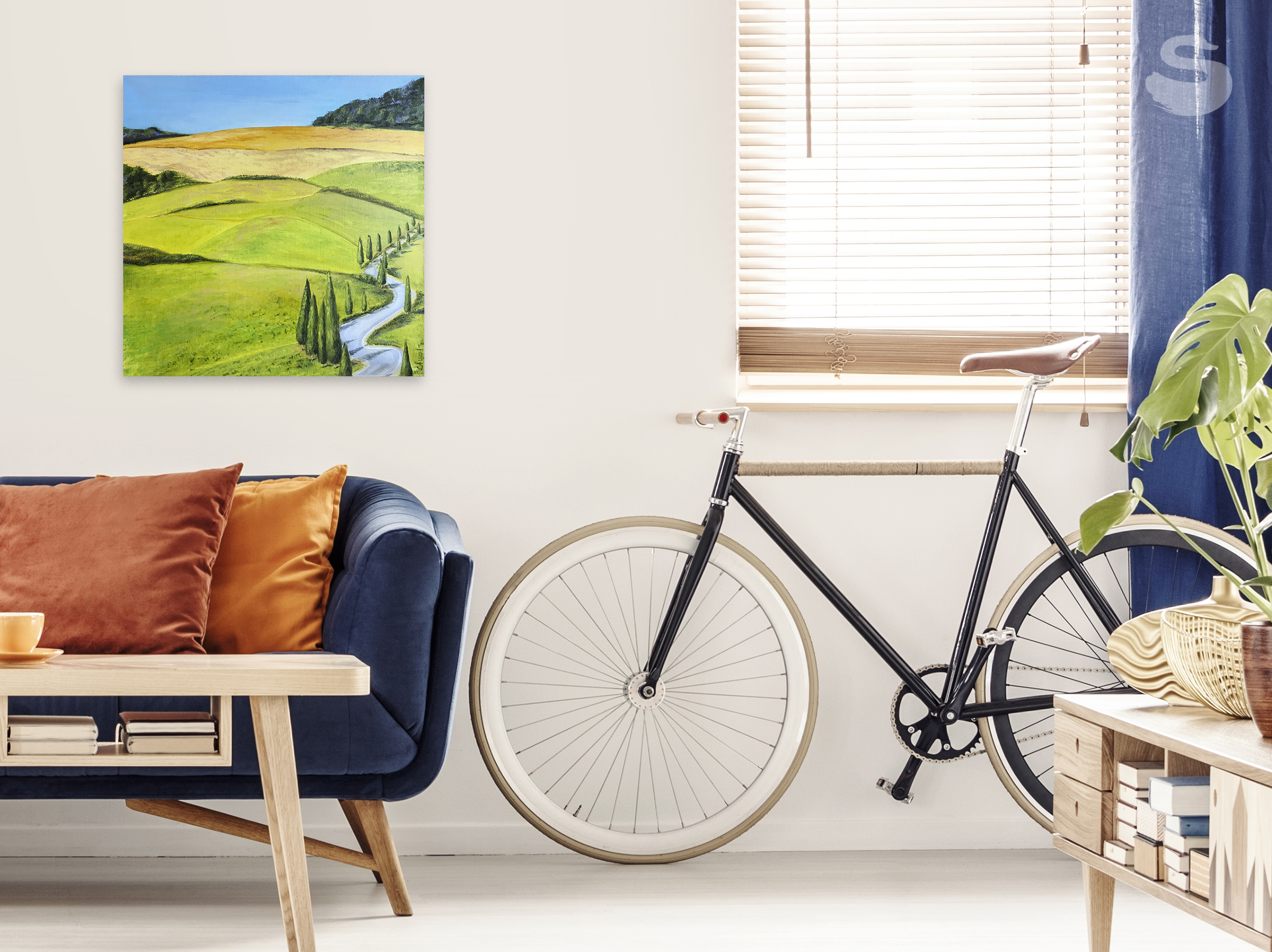 Toscana, Italy oil painting by Lana Swan shown on a living room wall above a sofa, next to a bicycle